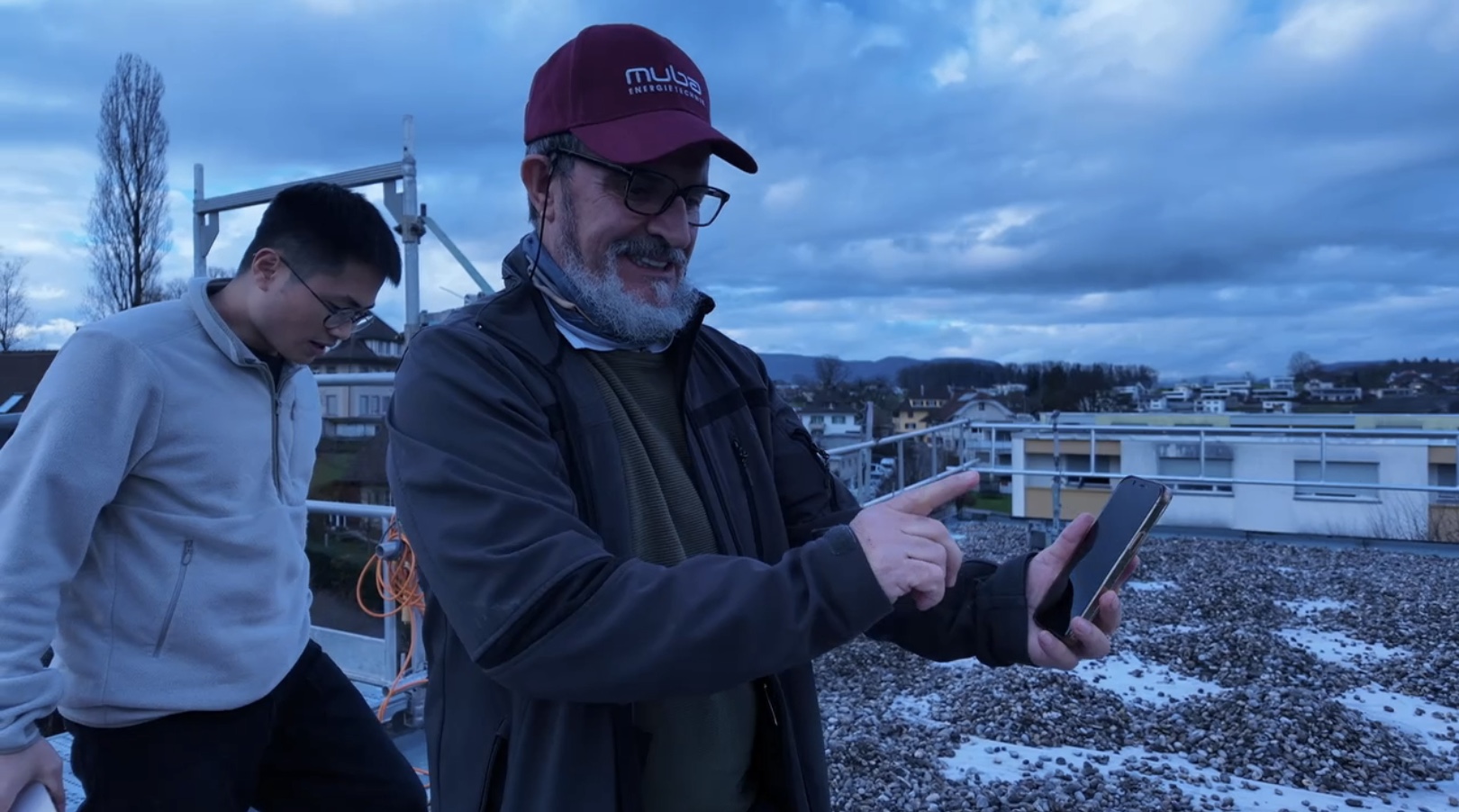 Ultimati Energie's technician monitoring solar and battery energy storage system during installation and commissioning